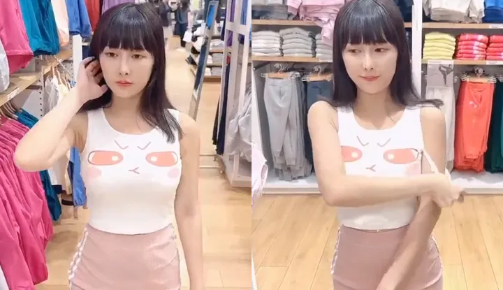 Hào hứng! Tháo áo ngực trong cửa hàng quần áo.