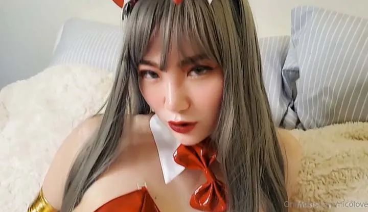 Quickly capture the sexy bunny girl in red latex stockings and a bodysuit.