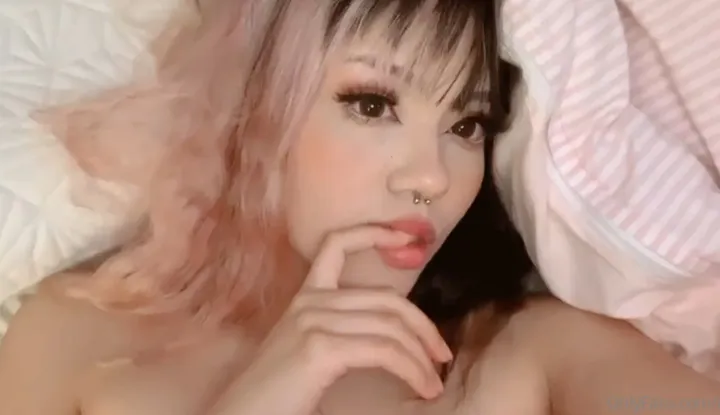 Pry apart the delicate pink entrance for you to insert