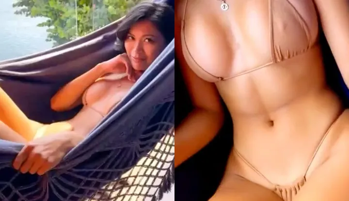Swinging on a hammock, the breasts are also swinging.