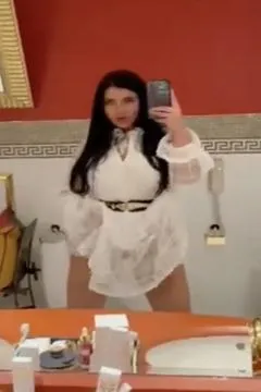 Taking provocative selfies in a large public restroom