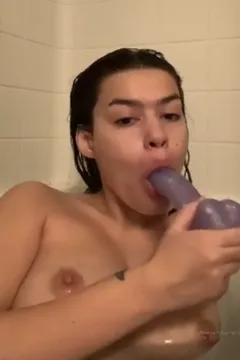 Sneak a bite wle taking a bath