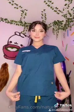 Naturebabe99 is a nurse at work, and a busty naughty girl after work.