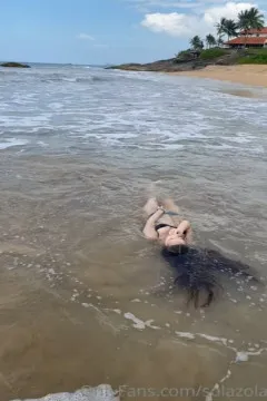 Solazola goes to the beach to play in the water