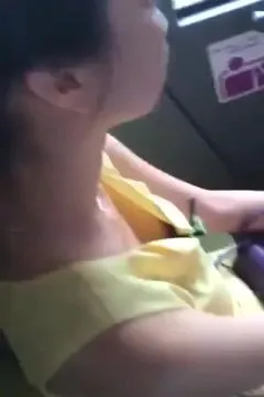 Taking Sneak Shots of Pretty Gal's Boobies on the Bus