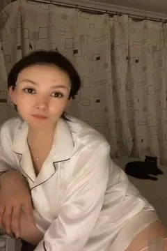 Beautiful young woman live streaming showing abalone