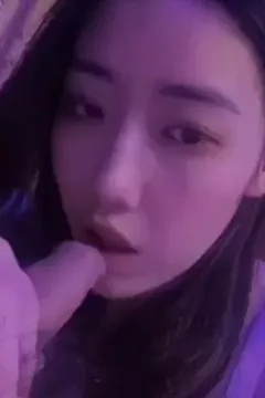 Beautiful girlfriend gently eats chicken