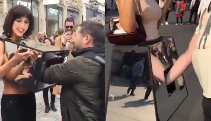 Erotic touch box! A beautiful woman invites passersby to