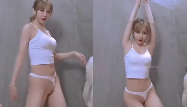 Influencer's revealing private photoshoot with beautiful model - dancing seductively and shaking her large breasts.